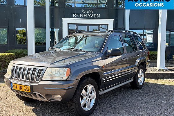 Jeep Grand Cherokee 4.7i V8 Overland High Output , YOUNGTIMER, FULL OPTIONS, 4X4, LEDER, AIRCO, SCHUIFKANTELDAK, PARROT, NWE APK, ETC