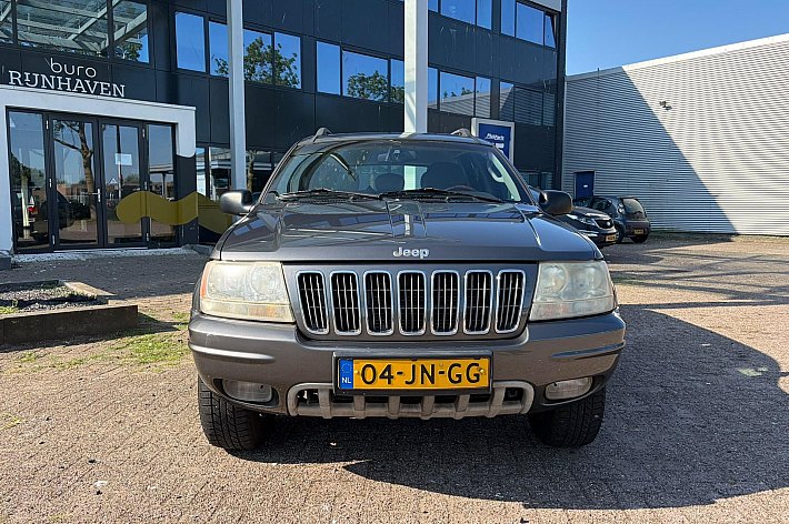 Jeep Grand Cherokee 4.7i V8 Overland High Output , YOUNGTIMER, FULL OPTIONS, 4X4, LEDER, AIRCO, SCHUIFKANTELDAK, PARROT, NWE APK, ETC