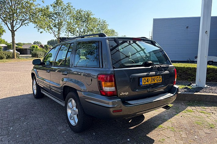 Jeep Grand Cherokee 4.7i V8 Overland High Output , YOUNGTIMER, FULL OPTIONS, 4X4, LEDER, AIRCO, SCHUIFKANTELDAK, PARROT, NWE APK, ETC