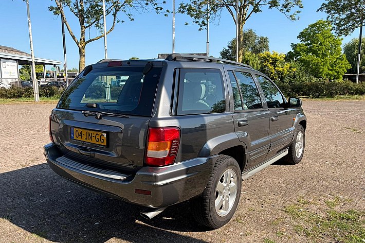 Jeep Grand Cherokee 4.7i V8 Overland High Output , YOUNGTIMER, FULL OPTIONS, 4X4, LEDER, AIRCO, SCHUIFKANTELDAK, PARROT, NWE APK, ETC